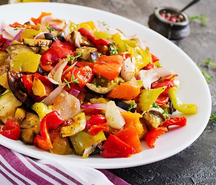 baked-vegetables-white-plate-eggplant-zucchini-tomatoes-paprika-onions_2829-17245