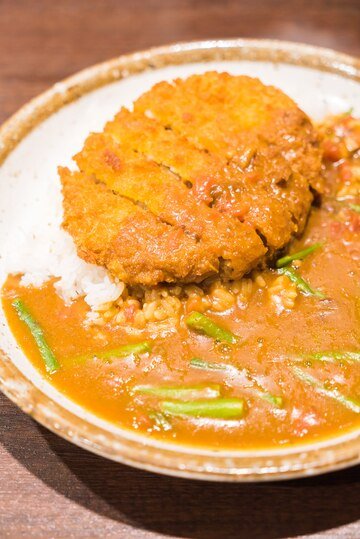 fried-pork-with-curry-sauce_74190-1932