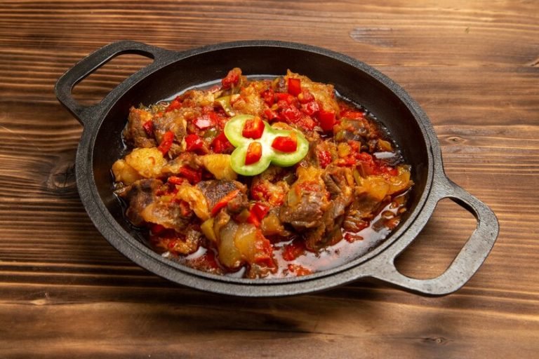 front-view-cooked-vegetable-meal-inside-pan-brown-wooden-desk_140725-61551