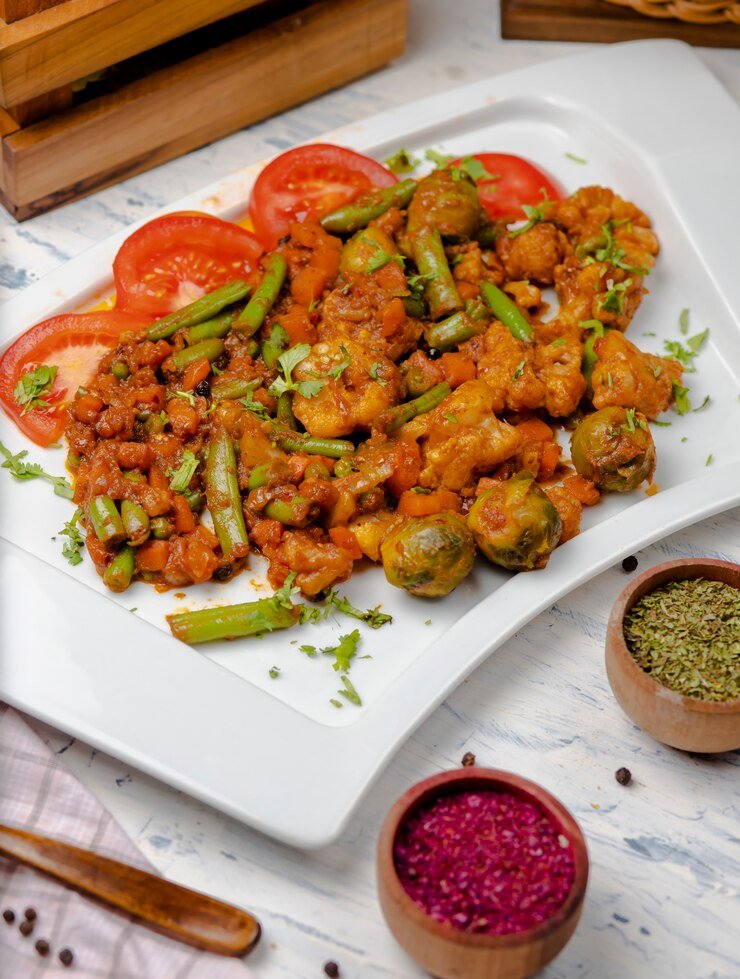 roasted-cauliflower-with-sprouts-beans-served-with-tomato-sauce-herbs_114579-283